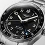 Close-up of the Longines Spirit Zulu Time, featuring a black dial, Swiss Super-LumiNova numerals and hands, date window, and a stainless steel case with matching bracelet.