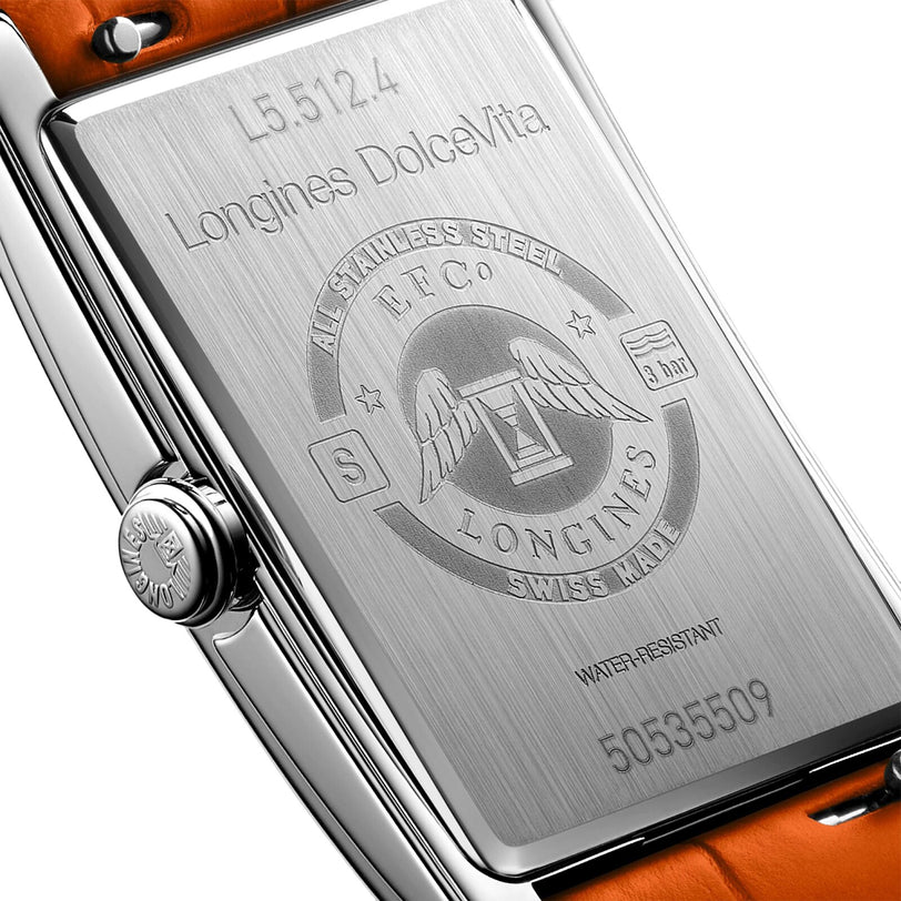 Close-up of the engraved case back of the Longines DolceVita Monochrome wristwatch, showcasing its logo, model number, serial number, stainless steel material, water resistance details, and precision quartz movement.