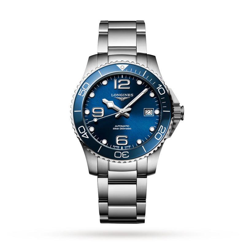 The Longines HydroConquest wristwatch features a stainless steel case, sunray blue dial with white markers, date display, and metal bracelet, displayed against a white background.