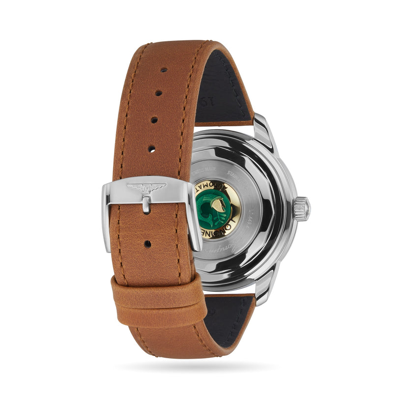The Longines Conquest Heritage, shown from the back, features a brown leather strap, stainless steel case, and exposed mechanical movement with green accents—seamlessly blending classic style with precise Swiss watchmaking.