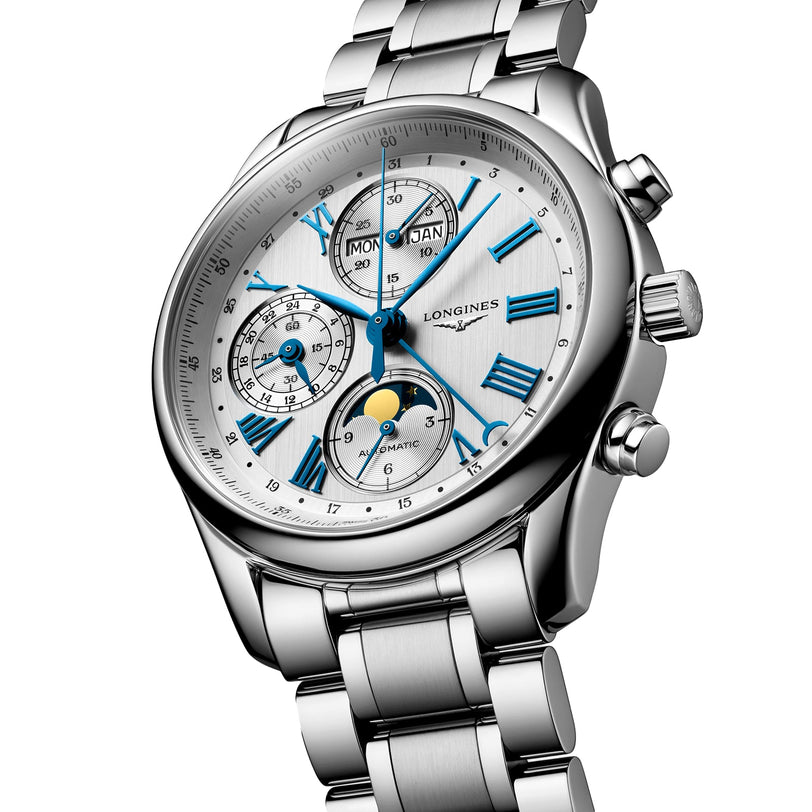 The Longines Master Collection Chrono Moonphase features a stainless steel band, blue Roman numerals, subdials for date, day, and month, automatic movement, and a moonphase display on a white dial.