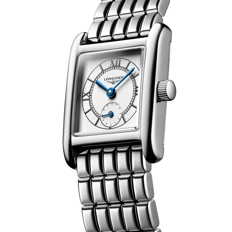 The Longines Mini DolceVita features a rectangular case, silver metal bracelet, white dial with blue hands, and a small seconds subdial at 6 oclock—a refined choice for lovers of sophisticated, elegant timepieces.