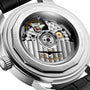 Close-up of the back of the Longines Conquest Heritage Central Power Reserve watch, showcasing its automatic calibre movement and intricate engravings on the stainless steel case.