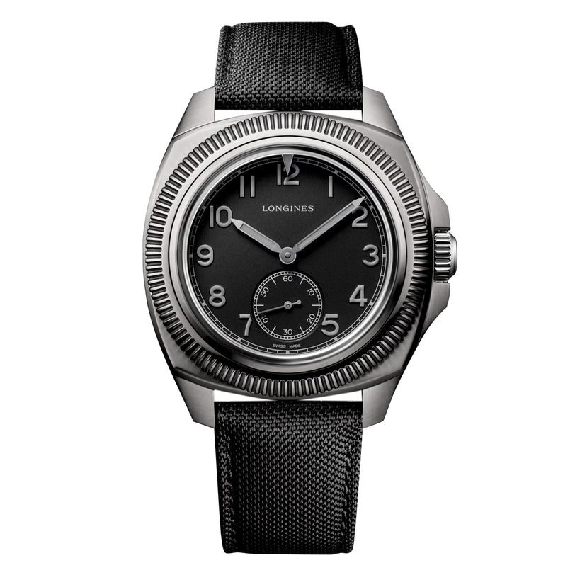 The Longines Pilot Majetek Pioneer Edition features a black dial with Arabic numerals, small seconds at 6 o’clock, a robust stainless steel case, black textured strap, and an advanced silicon balance-spring for enduring precision.