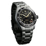 The Longines Spirit Zulu Time is a stainless steel wristwatch featuring a black dial, luminous markers, and a silver metal bracelet.