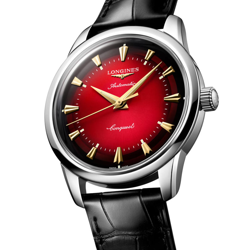 The Longines Conquest Heritage Year Of The Snake Edition features a red gradient dial, gold markers and hands, the LONGINES L888.5 calibre, and a black leather strap.