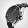 A Tissot T-Touch Connect Solar smartwatch in black and silver with a black rubber strap, displayed at an angle to highlight its side buttons.