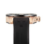 Side view of the Tissot T-Touch Connect Solar, featuring a gold antimagnetic titanium case, black bezel, black rubber strap, and a side button labeled BACK.
