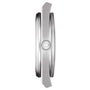 Side view of the Tissot PRX wristwatch in silver, displaying its slim case with a “T” logo crown and a design inspired by the 1970s.