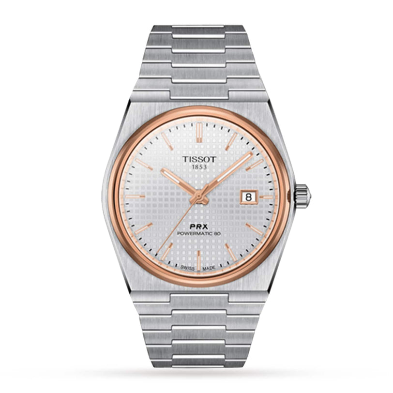 The Tissot PRX Powermatic 80 is a silver watch with a white textured dial, gold bezel, date display at 3 o’clock, and a durable stainless steel case and bracelet.