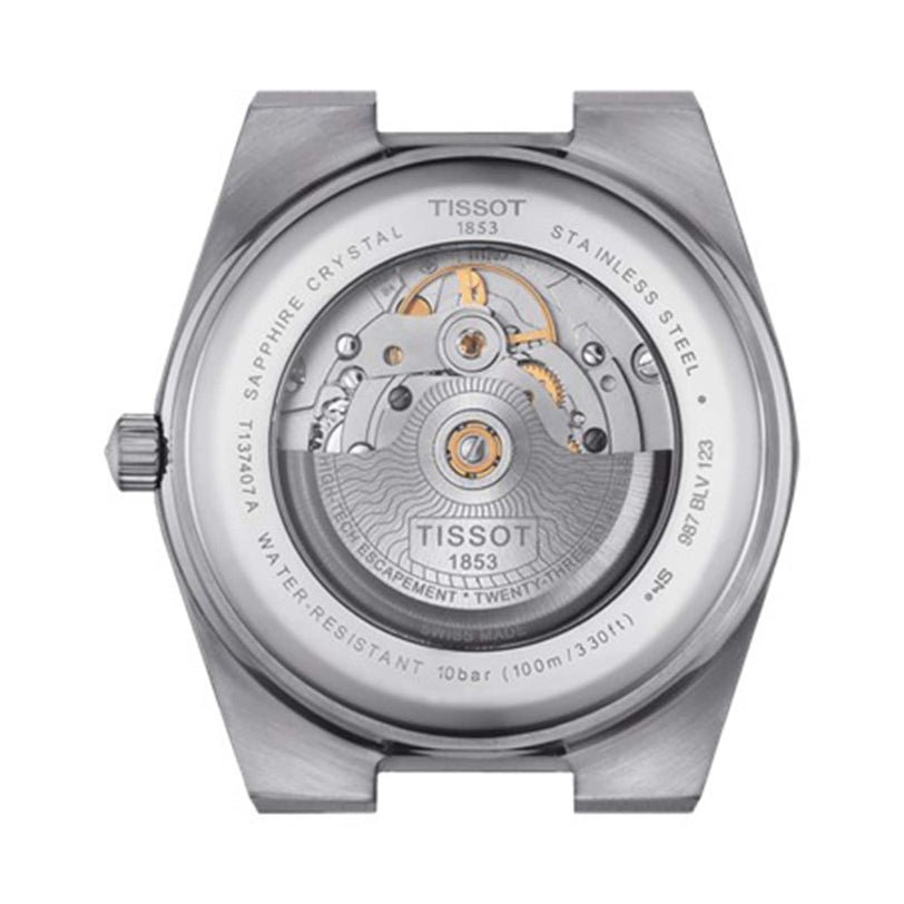 Close-up of the Tissot PRX Powermatic 80s caseback reveals its stainless steel case, sapphire crystal, and the intricately engraved Powermatic 80 movement.