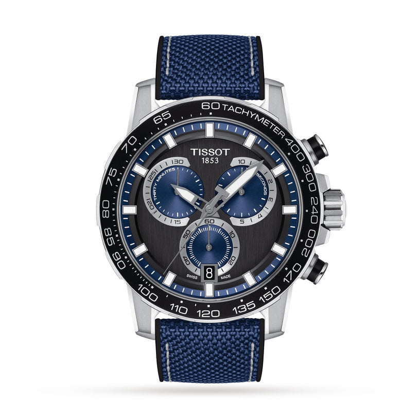 The Tissot Supersport Chrono features a black dial with blue subdials, tachymeter bezel, blue textured strap, and precise Swiss quartz movement, displaying 1:53:12.
