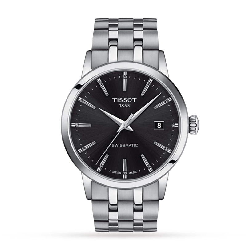 The Tissot Classic Dream Swissmatic features a silver metal link bracelet, black dial, date at 3 o’clock, and precise Swissmatic automatic movement. The time displayed is 10:08:38.