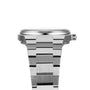 Side view of the Tissot PRX Powermatic 80 shows its stainless steel case, brushed metal bracelet, visible crown, and signature design, photographed against a white background.
