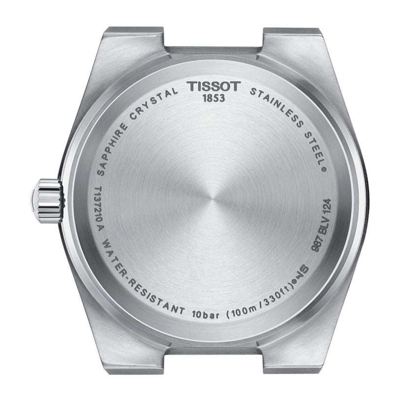 Back view of a Tissot PRX watch case displays engraved brand name, Swiss quartz movement, stainless steel, sapphire crystal, model number, and water resistance up to 10 bar.