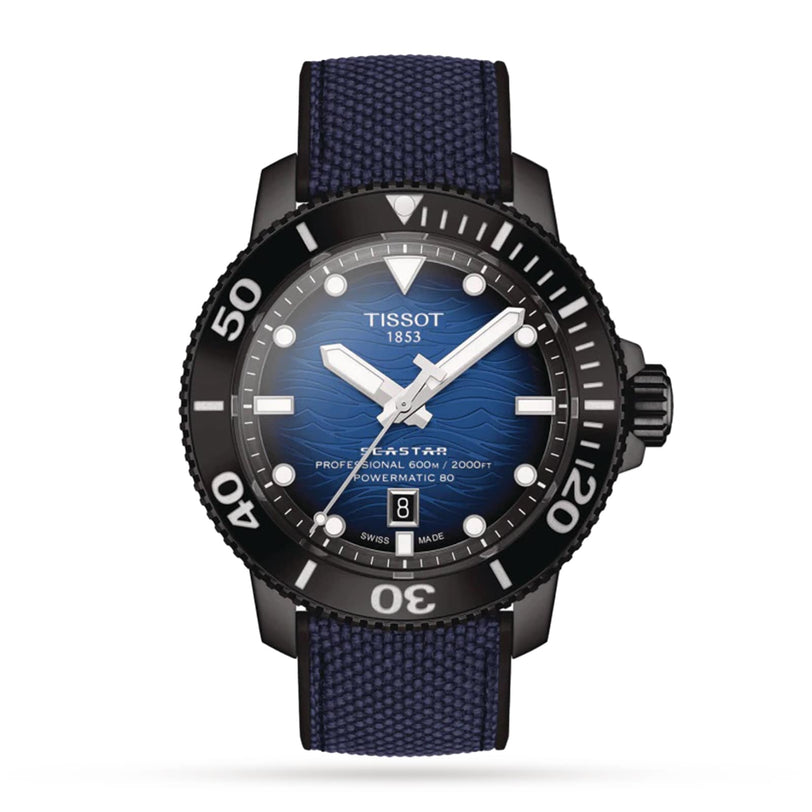 A Tissot Seastar 2000 Professional Powermatic 80 watch with a blue gradient dial, black rotating bezel, and blue fabric strap, displaying the time 10:08.