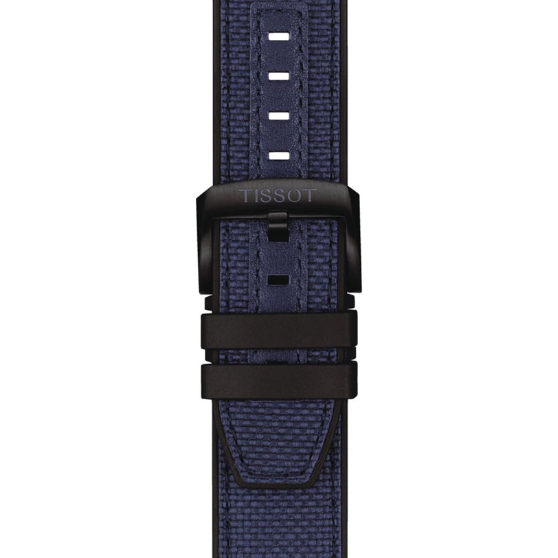 Close-up of a blue textured Tissot Seastar 2000 Professional Powermatic 80 diver’s watch strap, featuring a black buckle and visible adjustment holes.