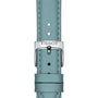 Close-up of a light blue leather strap with a silver buckle engraved Tissot, showcasing the refined elegance of the Tissot Carson Premium Moonphase watch.