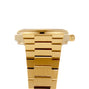 Side view of the Tissot PRX Powermatic 80 in gold, showcasing a metal link bracelet, right-side crown, and the innovative Nivachron hairspring.