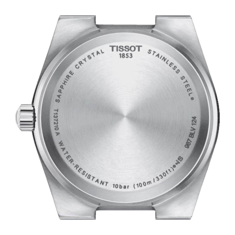 Back view of the Tissot PRX watch case displays engraved specs like water resistance, sapphire crystal, and model numbers—a stylish retro-inspired timepiece with modern features.