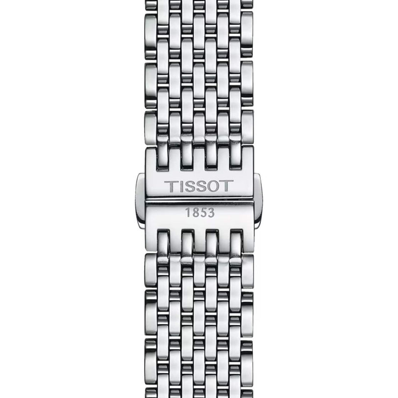 Close-up of a silver metal Tissot Everytime bracelet clasp, featuring the TISSOT 1853 engraving—a hallmark of timeless design.