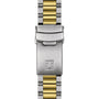 Close-up of the Tissot PR516 Chronograph’s two-tone bracelet, featuring silver and gold links and a clasp engraved with a T.