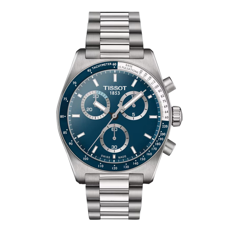 The Tissot PR516 Chronograph is a silver watch with a blue face, three subdials, and a metal link band.