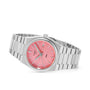 The Tissot PRX is a retro watch with a stainless steel bracelet, pink dial, silver hour markers, and date display—all presented against a white background.