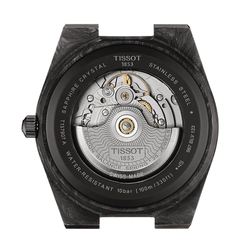 Back view of the Tissot PRX Powermatic 80 Carbon, showcasing its forged carbon case, sapphire crystal, automatic movement, and engraved specs such as water resistance and model details.