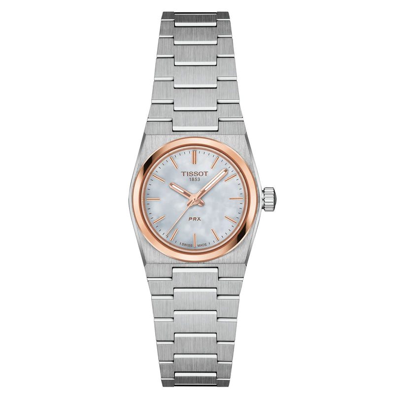 A Tissot PRX wristwatch featuring a 25mm silver-tone case, metal link band, round white dial, rose gold bezel, minimalist hour markers, and precise quartz movement.