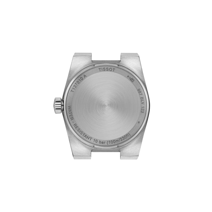 The back of the Tissot PRX watch case showcases engravings detailing the model, quartz movement specs, water resistance, and features a brushed metal finish.