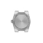 The back of the Tissot PRX watch case showcases engravings detailing the model, quartz movement specs, water resistance, and features a brushed metal finish.