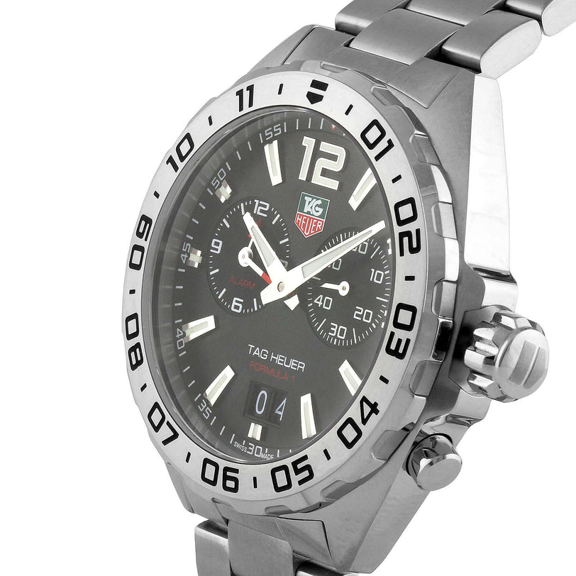 The TAG Heuer Formula 1 Date wristwatch features a silver stainless steel bracelet, black dial, and date display.
