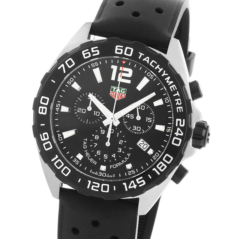 The TAG Heuer Formula 1 Chronograph features a black dial, tachymeter bezel, three subdials, date display, and a stylish black rubber strap.