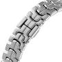 Close-up of the TAG Heuer Link Dates shiny, interlocking rectangular metal watch band on a white background.