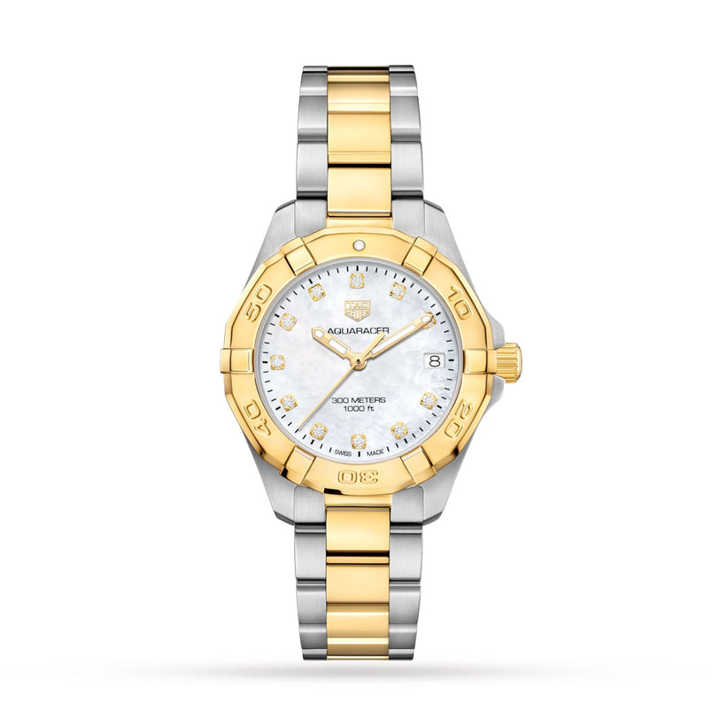The TAG Heuer Aquaracer Date is a two-tone stainless steel and gold sports watch with a white dial, diamond hour markers, date window, and Aquaracer branding, displayed on a plain white background.