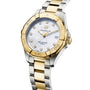 The TAG Heuer Aquaracer Date is a two-tone sports watch with a mother-of-pearl dial, gold bezel, diamond hour markers, date display at 3 o’clock, and a metal bracelet.