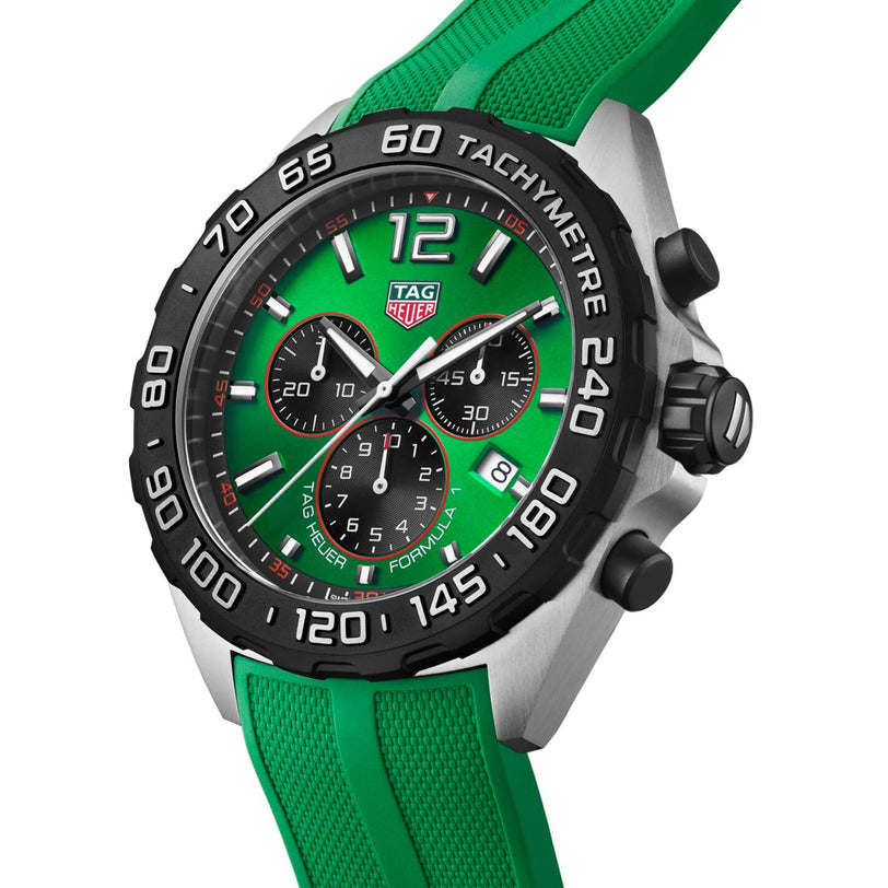 The TAG Heuer Formula 1 Chronograph features a green dial, black bezel, three sub-dials, tachymeter scale, green rubber strap, and durable quartz movement.