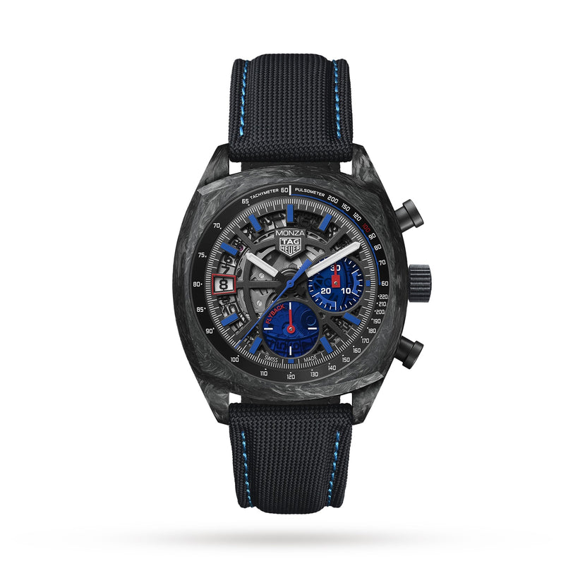 The COSC-certified TAG Heuer Monza Flyback Chronometer features a black carbon case, skeleton dial with blue and red accents, black strap with blue stitching, and three sub-dials inspired by motorsports.