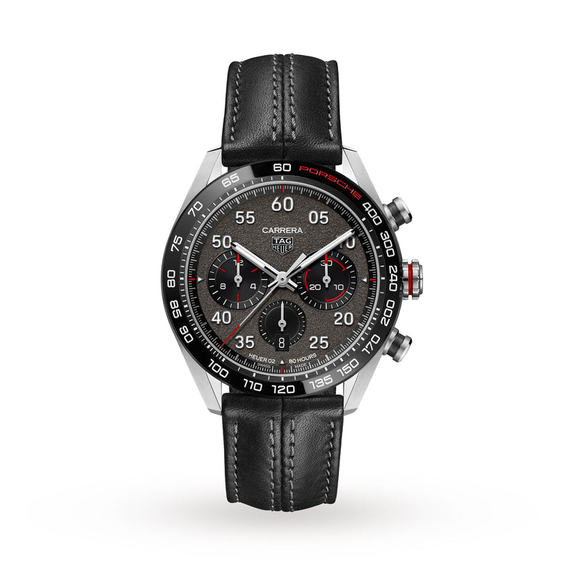 The TAG Heuer Special Edition Carrera Chronograph x Porsche features a black leather strap, black tachymeter bezel, black dial with three subdials and red accents.