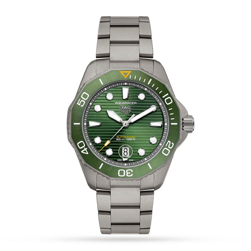 The TAG Heuer Aquaracer Professional 300 Date features a stainless steel bracelet, green dial and bezel, silver hour markers, date display, and a sturdy titanium case for peak sports performance.