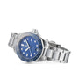 The TAG Heuer Aquaracer Professional 300 Date, a stainless steel dive watch with a blue dial, diamond hour markers, and a unidirectional bezel, is displayed at an angle on a white background.