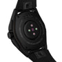 Close-up of the Connected Calibre E4 by TAG Heuer, showcasing its sensor array on the back, titanium case, and rubber strap.