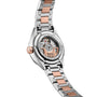 Back view of the TAG Heuer Carrera Date watch featuring an exposed movement, two-tone metal band, and rose gold accents.