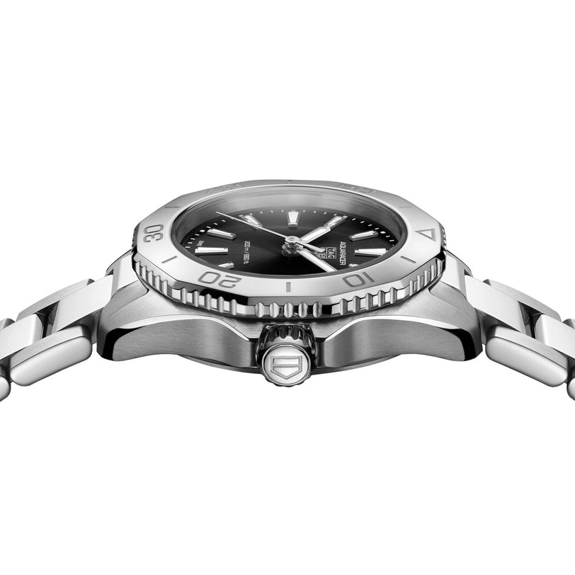 Side view of the TAG Heuer Aquaracer Professional 200 sports watch with a stainless steel case, black dial, rotating bezel, and metal bracelet, showcasing crown and case detailing.