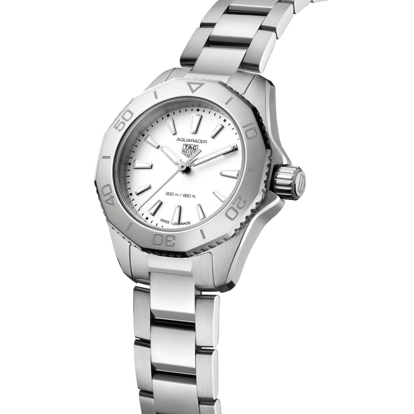 The TAG Heuer Aquaracer Professional 200, a silver sports watch with a white dial, silver hour markers, and stainless steel case and bracelet, is displayed at an angle on a white background.