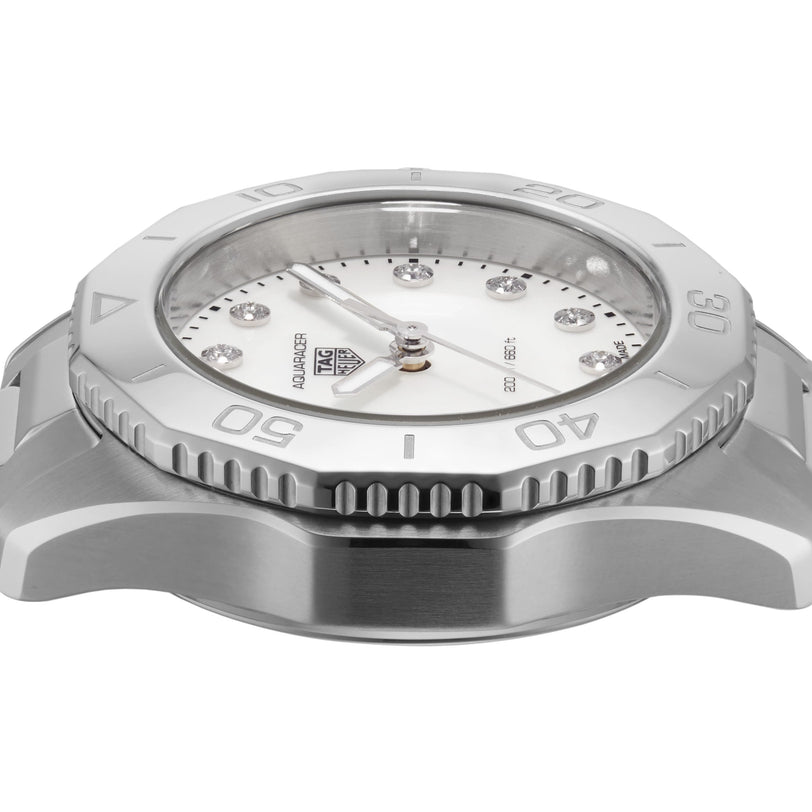 Close-up side view of the TAG Heuer Aquaracer Professional 200 sports watch with a stainless steel case, silver bezel, white dial, and diamond hour markers.