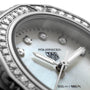 Close-up of the TAG Heuer Aquaracer Professional 200 watch face, featuring diamond hour markers, a sparkling diamond bezel, and a 200 m / 660 ft water resistance marking.