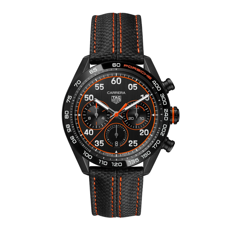 The TAG Heuer Special Edition Carrera Chronograph x Porsche Orange Racing features a black case, bold orange accents, three subdials, and a black textured strap with vivid orange stitching.