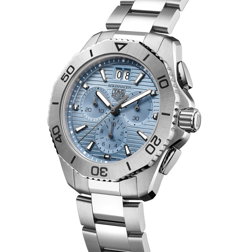 The TAG Heuer Aquaracer Professional 200 Chronograph features a light blue textured dial, chronograph subdials, date display, and a sleek stainless steel bracelet.